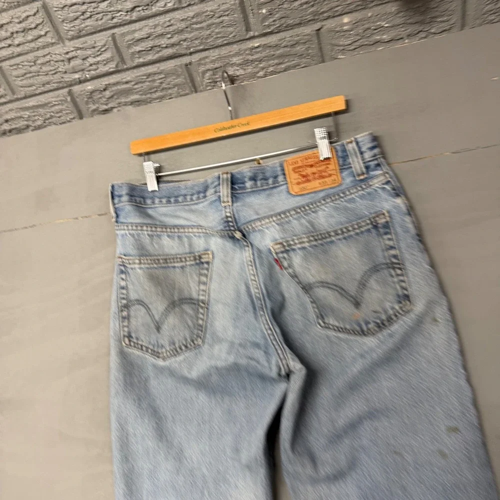Levis 550 Relaxed Fit Tapered Leg Light Wash Jeans Mens 33x34 Vintage Distressed